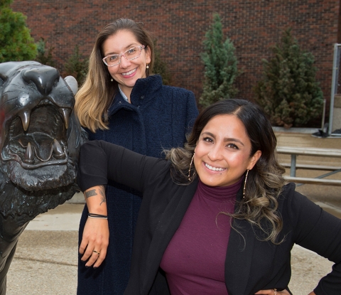 Graduate students with the Bengal statue