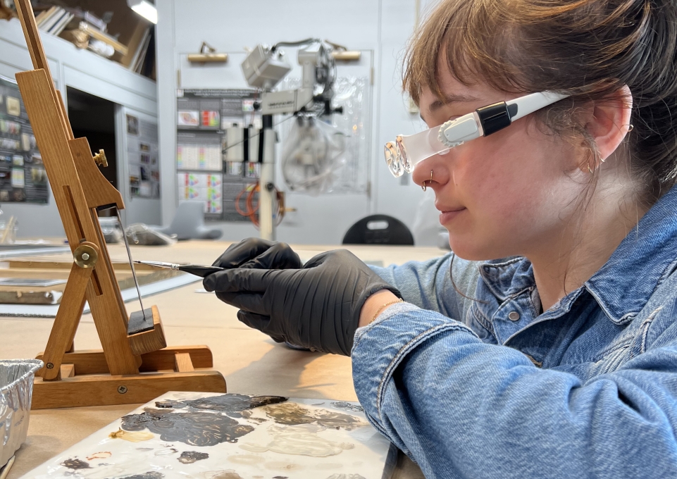 Rebecca Heyman working in conservation lab
