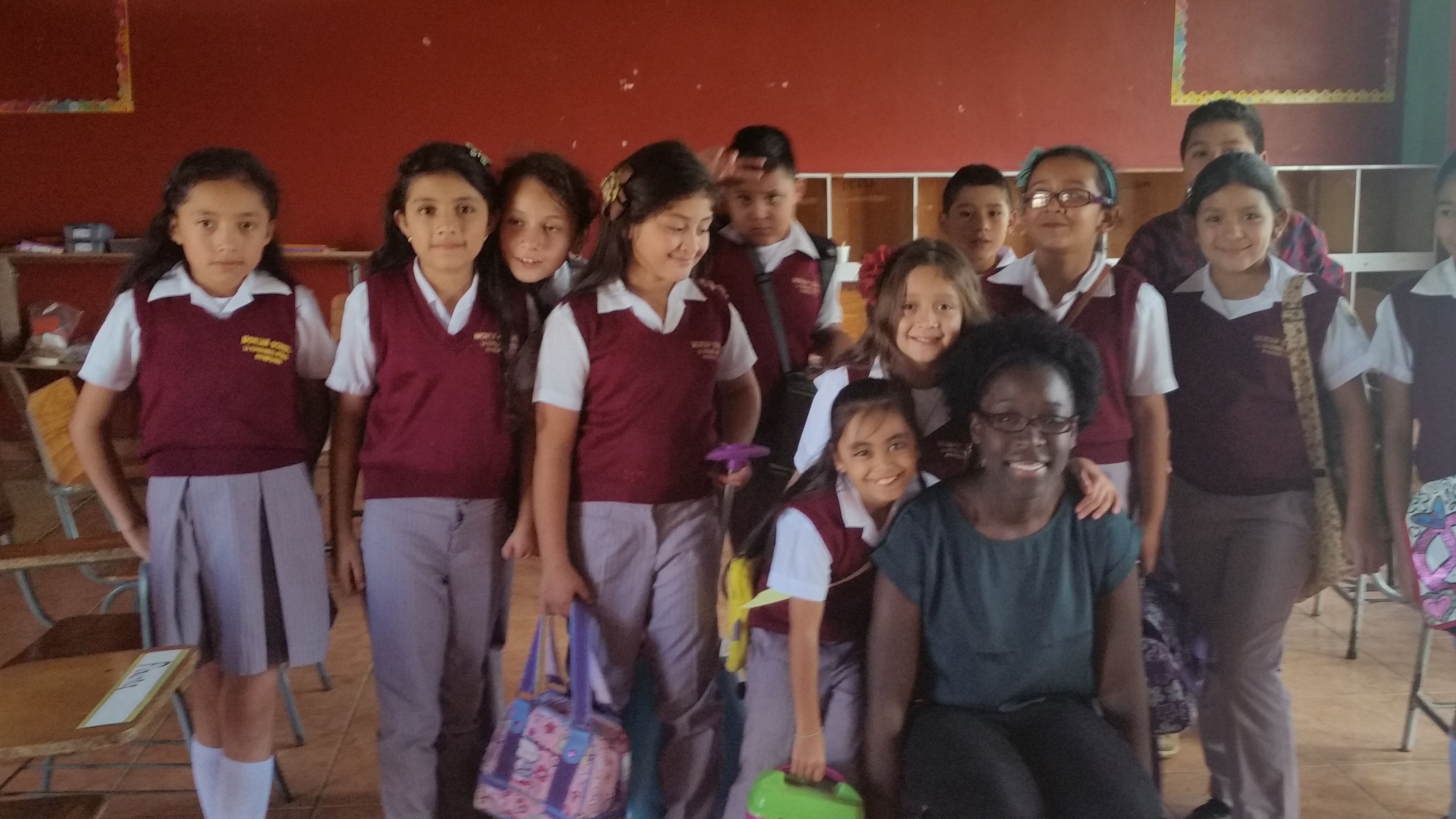 Crystal Holmes-Smith with students in Honduras
